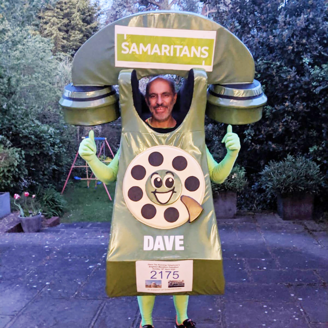 Dave wearing a telephone costume with Samaritans written across the top