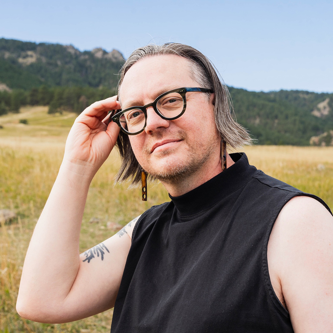 Headshot of Lucas outside